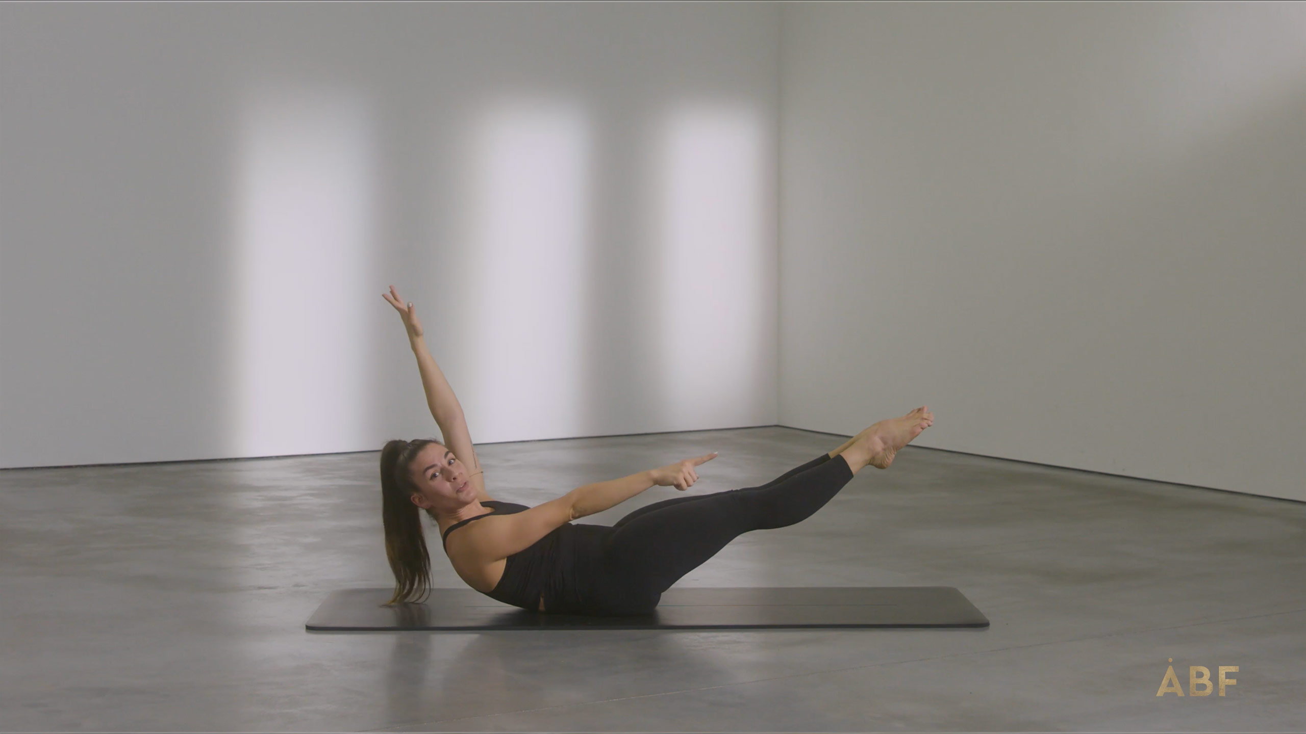 Woman doing double leg stretch exercise