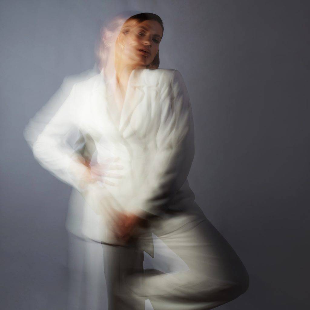 Fashion,Portrait,With,The,Effect,Of,Blurring,In,Motion,At