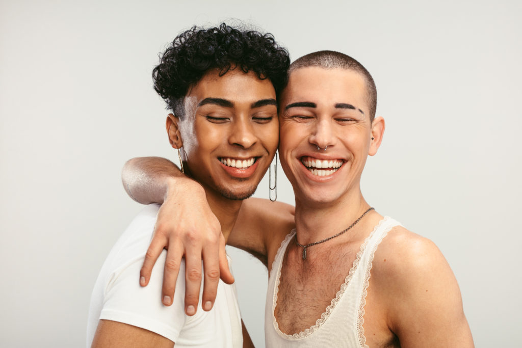 Young,Gay,Couple,In,Love,On,A,White,Background.,Two