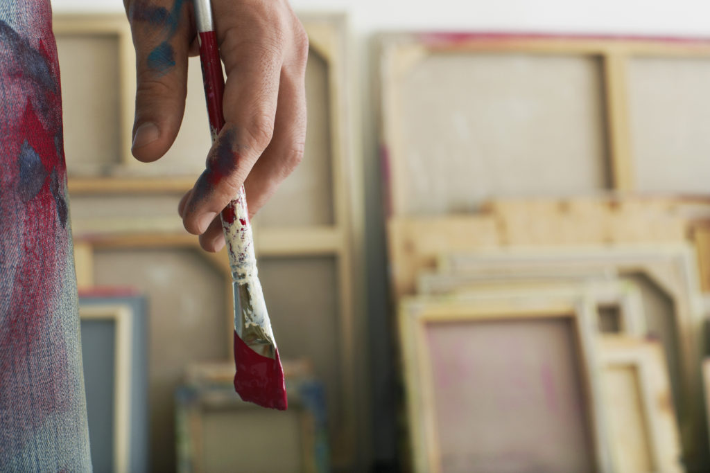 Closeup,Of,An,Artist,Holding,Paintbrush