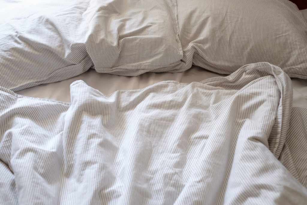 Cotton,Crumpled,Bed,Background,After,Sleeping,On,It,In,Hotel